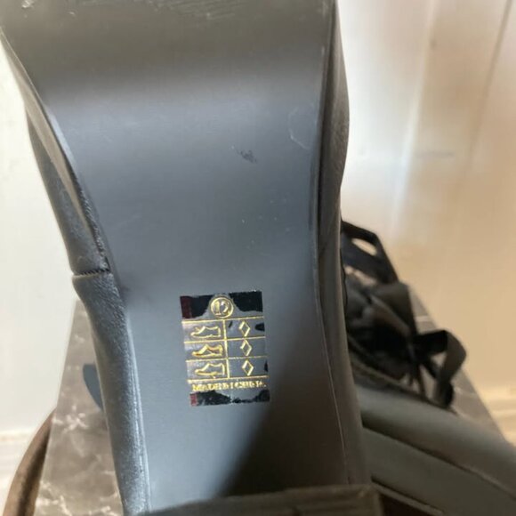 This is a pair of black platform high heels. - Picture 6 of 6